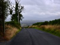 Z50_5859  De laatste heuvel voor Craiguenamanagh met uitzicht over de Blackstairs Mountains : fietsvakantie, Ierland